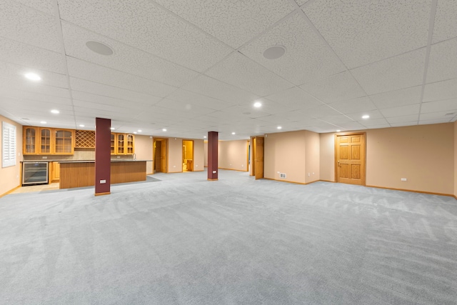 2811 Haven Ct, Naperville, IL 60564 - below grade area with baseboards, light colored carpet, and wine cooler