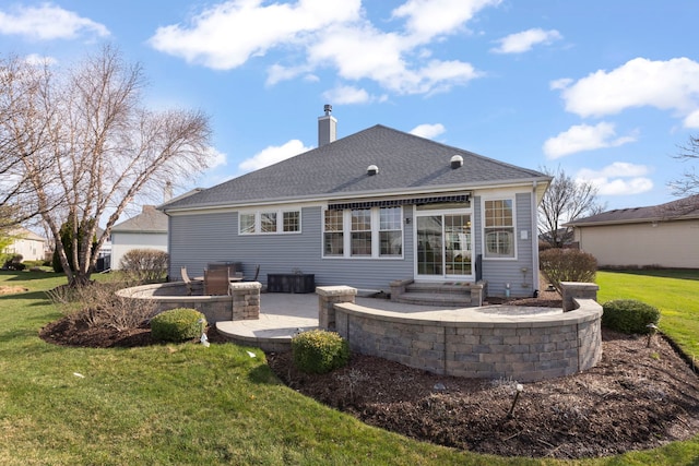 2811 Haven Ct, Naperville, IL 60564 - rear view of house featuring entry steps, a patio, a chimney, roof with shingles, and a lawn