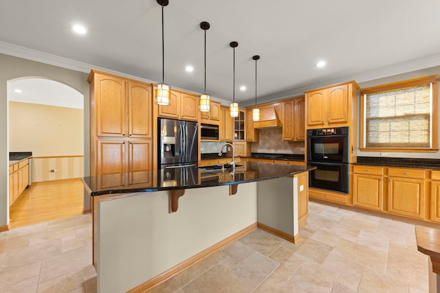 2811 Haven Ct, Naperville, IL 60564 - kitchen featuring a sink, appliances with stainless steel finishes, a kitchen island with sink, arched walkways, and ornamental molding