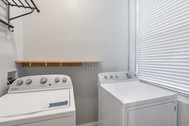 laundry area featuring laundry area and washing machine and dryer