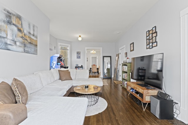 living room featuring dark wood-type flooring