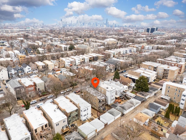 drone / aerial view featuring a city view