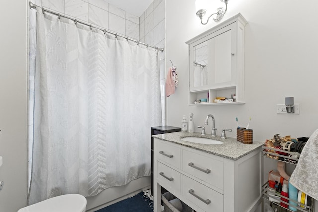 full bath with shower / bathtub combination with curtain, toilet, and vanity