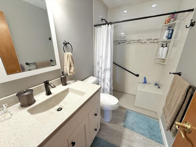 full bathroom with toilet, a tile shower, and vanity