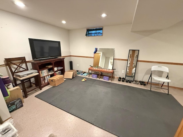 exercise room featuring recessed lighting