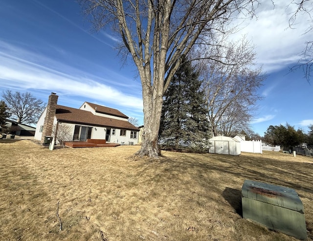 view of yard featuring a wooden deck