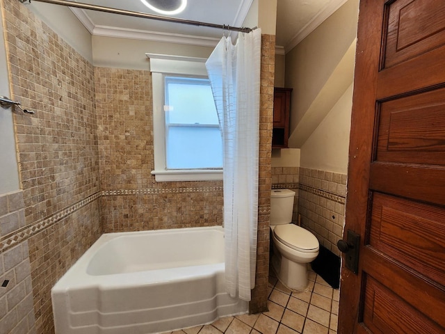 bathroom featuring toilet, a wainscoted wall, tile walls, tile patterned floors, and crown molding