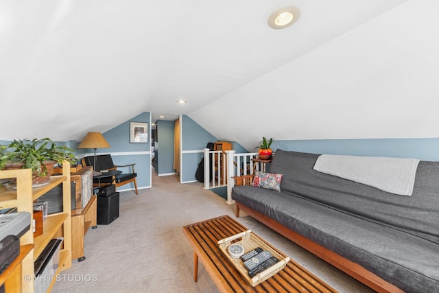 living area with lofted ceiling, baseboards, and carpet floors