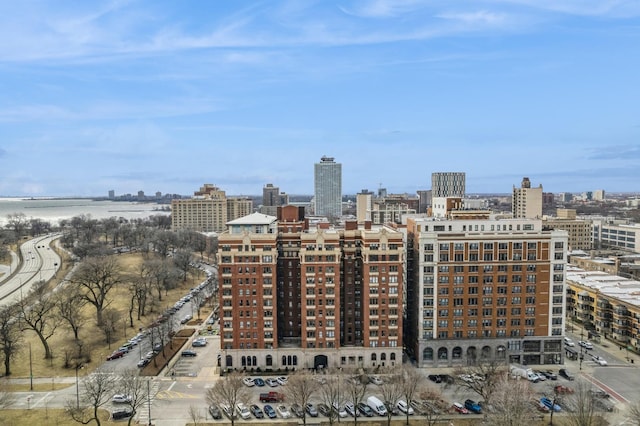 property's view of city featuring a water view