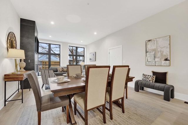4343 N Richmond Ave Unit 1S, Chicago, IL 60618 - dining area with light wood finished floors, recessed lighting, and baseboards