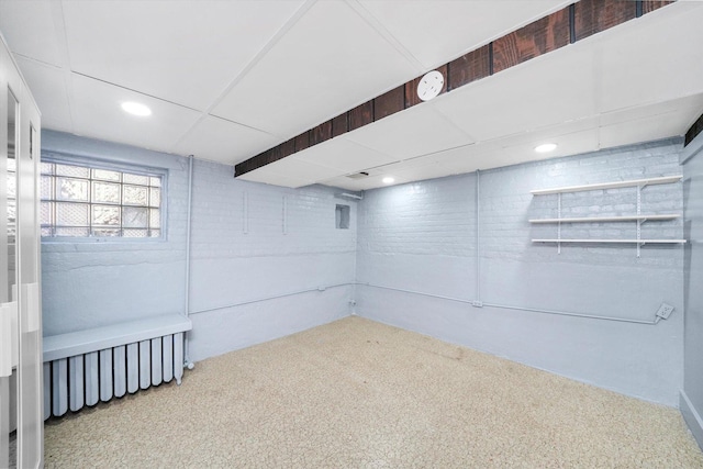 basement featuring carpet flooring and recessed lighting