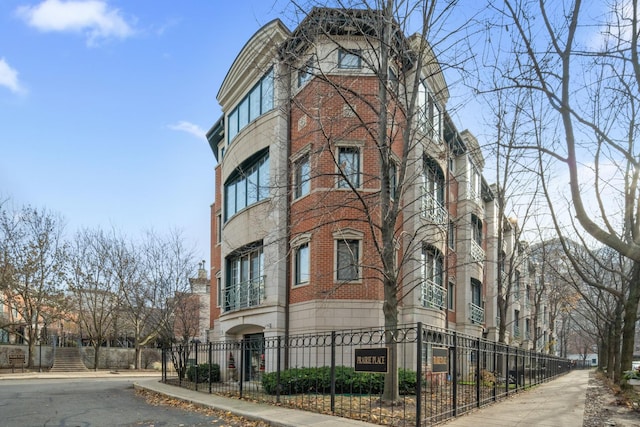 view of property featuring a fenced front yard