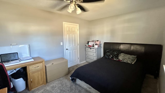 carpeted bedroom with a ceiling fan