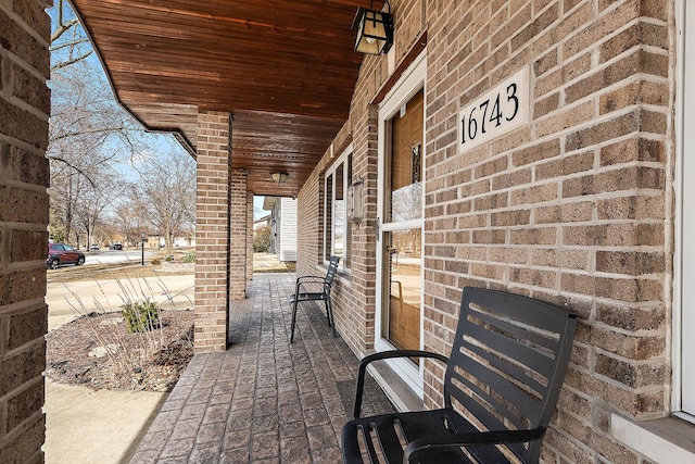 view of patio featuring a porch