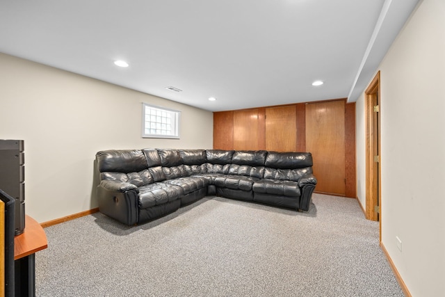 living area featuring recessed lighting, light colored carpet, visible vents, and baseboards