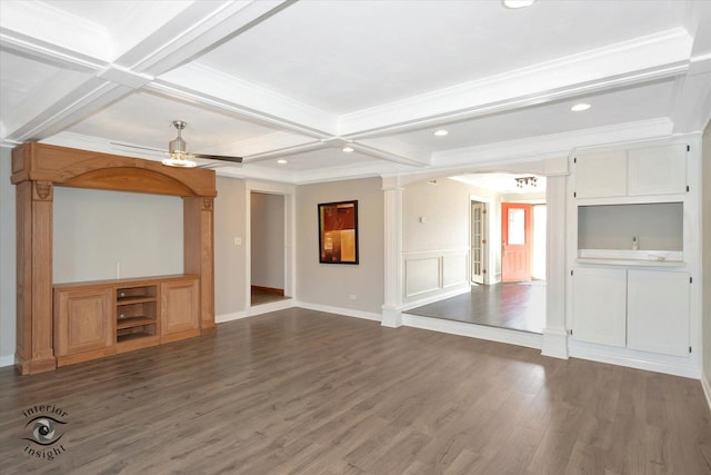 unfurnished living room with beamed ceiling, ornamental molding, wood finished floors, coffered ceiling, and ornate columns