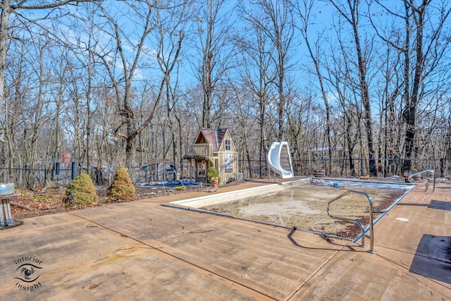 view of pool with fence