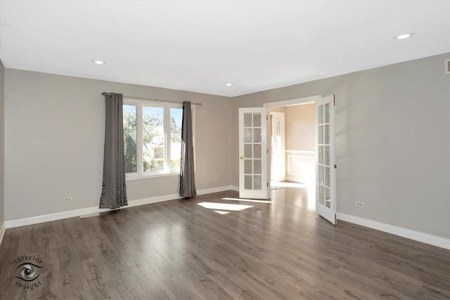 empty room with recessed lighting, french doors, baseboards, and dark wood-style flooring