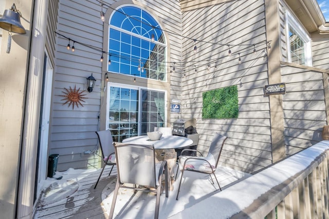 deck featuring outdoor dining area