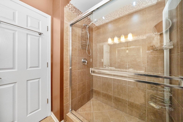 bathroom featuring a shower stall