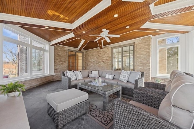 sunroom / solarium featuring wooden ceiling