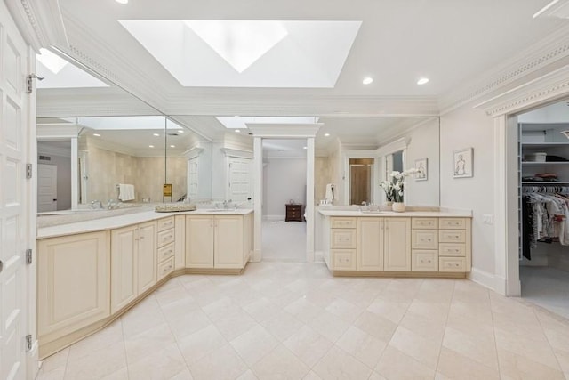 bathroom with a skylight, two vanities, recessed lighting, a stall shower, and crown molding