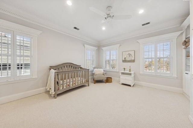 bedroom featuring visible vents, baseboards, carpet, and ornamental molding