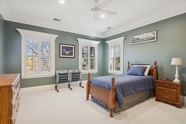 bedroom with multiple windows, ornamental molding, baseboards, and carpet floors