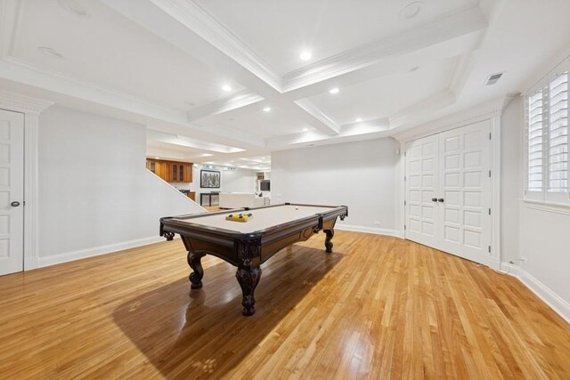 game room featuring light wood-style flooring, coffered ceiling, crown molding, and baseboards