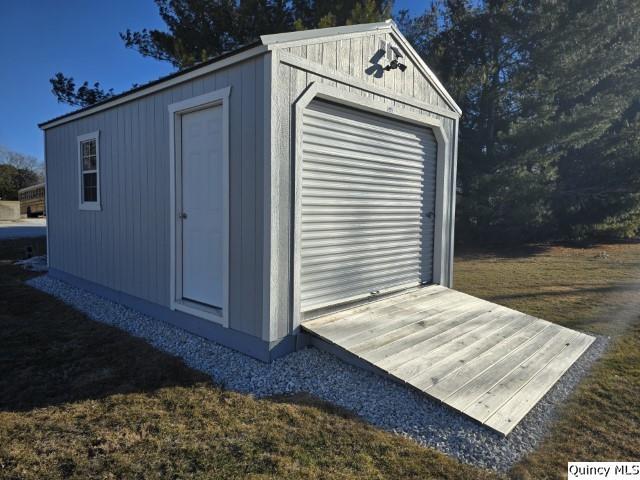 view of outbuilding featuring an outdoor structure