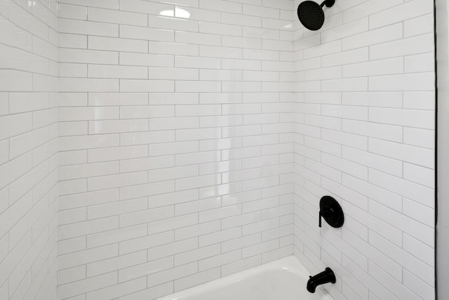 bathroom with shower / bathtub combination