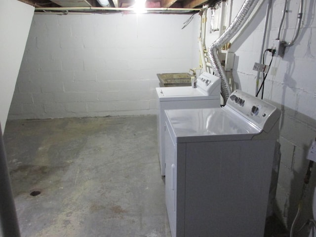 clothes washing area with laundry area and separate washer and dryer