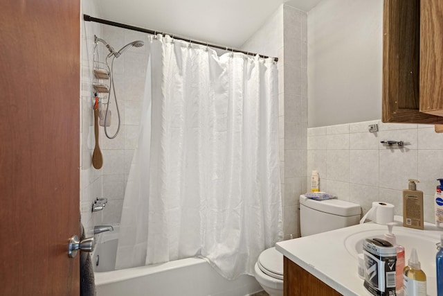 bathroom featuring vanity, toilet, tile walls, and shower / bathtub combination with curtain