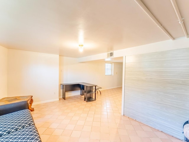 interior space with visible vents and baseboards