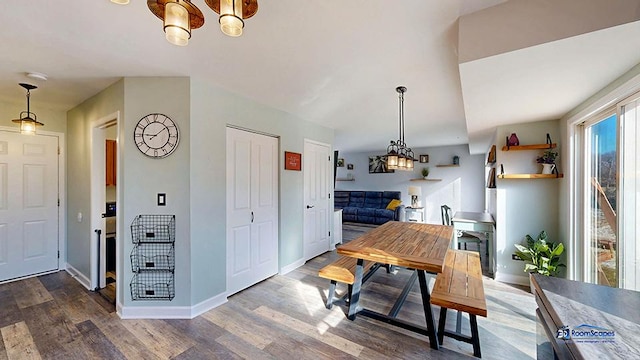 950 Donnelly Pl, Mchenry, IL 60050 - dining space with dark wood-style flooring and a chandelier