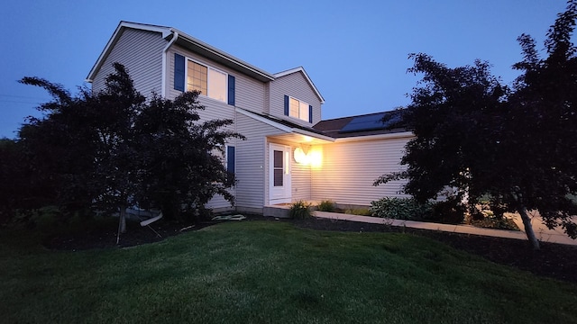 950 Donnelly Pl, Mchenry, IL 60050 - view of side of home with roof mounted solar panels and a lawn