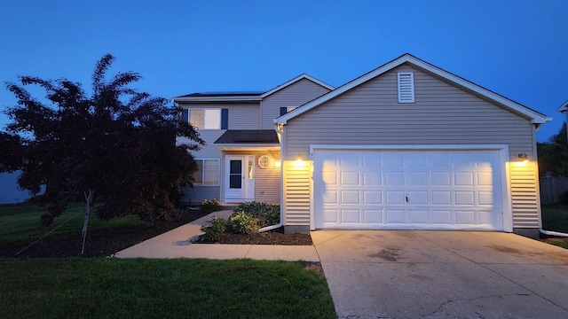 950 Donnelly Pl, Mchenry, IL 60050 - traditional-style house with concrete driveway and an attached garage