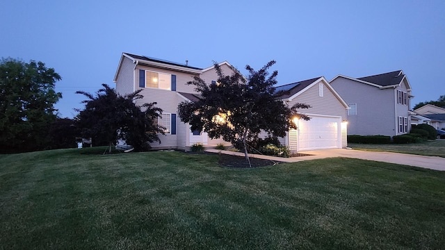 950 Donnelly Pl, Mchenry, IL 60050 - view of property hidden behind natural elements with solar panels, a front yard, and driveway