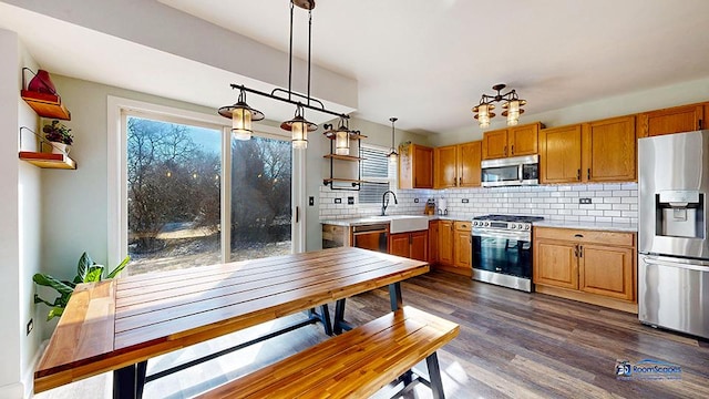 950 Donnelly Pl, Mchenry, IL 60050 - kitchen with stainless steel appliances, open shelves, light countertops, and backsplash