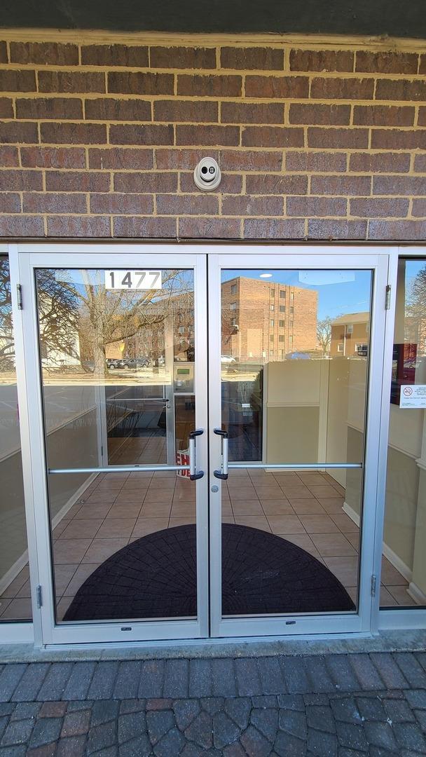 property entrance featuring french doors