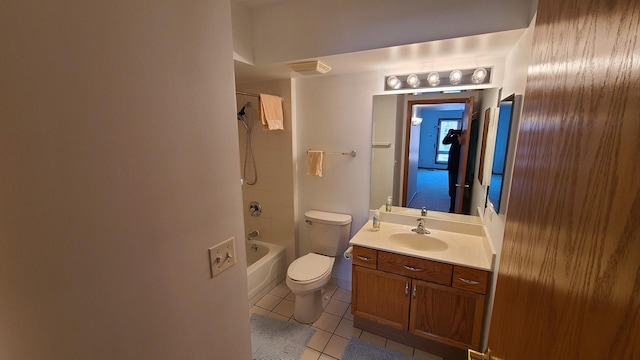 full bathroom with toilet, vanity, visible vents, tile patterned floors, and washtub / shower combination