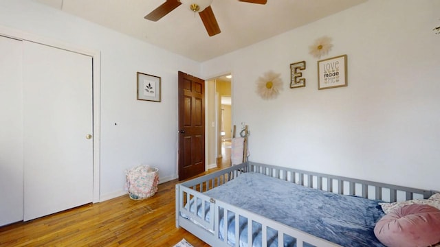 bedroom featuring ceiling fan and wood finished floors