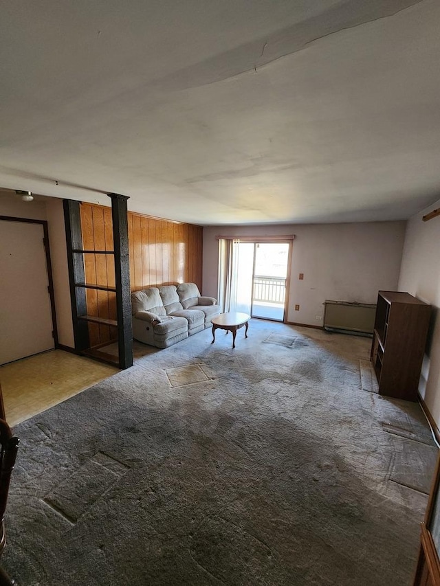 unfurnished living room with carpet floors