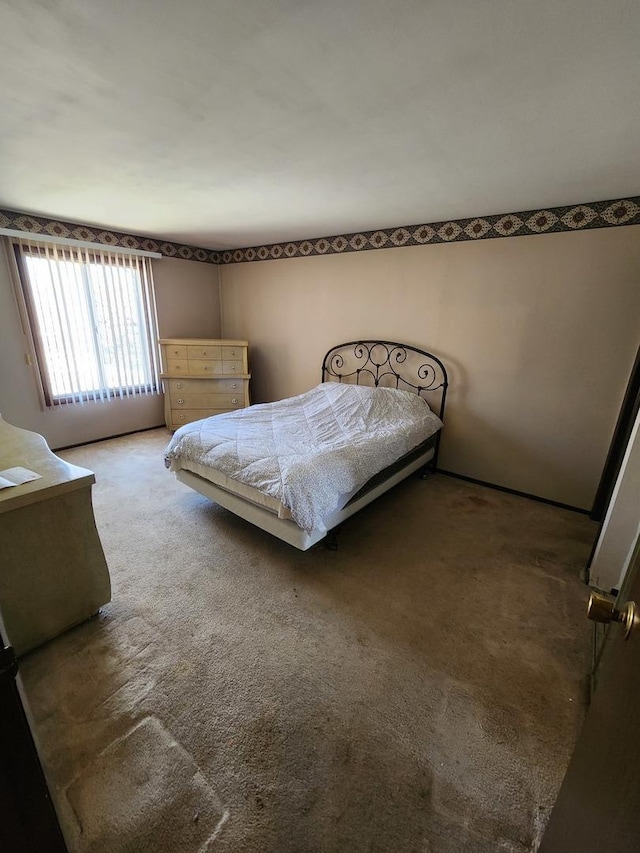 bedroom featuring carpet flooring