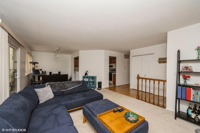 living area with carpet floors