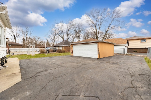 detached garage with fence