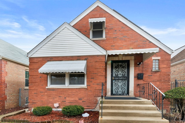 view of front of property with brick siding