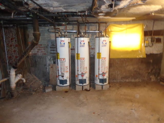 utility room with water heater