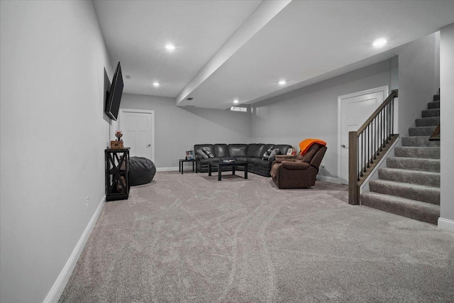 living area featuring carpet flooring, recessed lighting, stairway, and baseboards