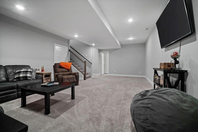 living room featuring recessed lighting, stairway, light carpet, and baseboards